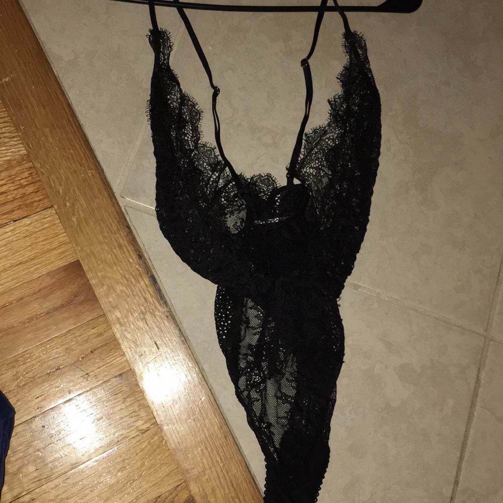 small sexy black lingerie bodysuit